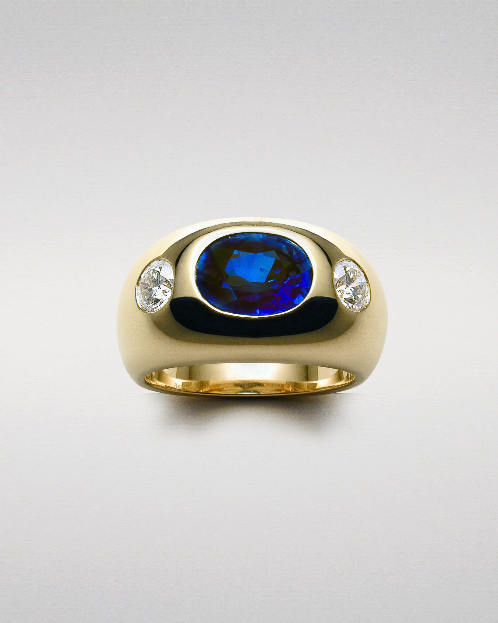 Sculptured Band with Sapphire and Diamonds