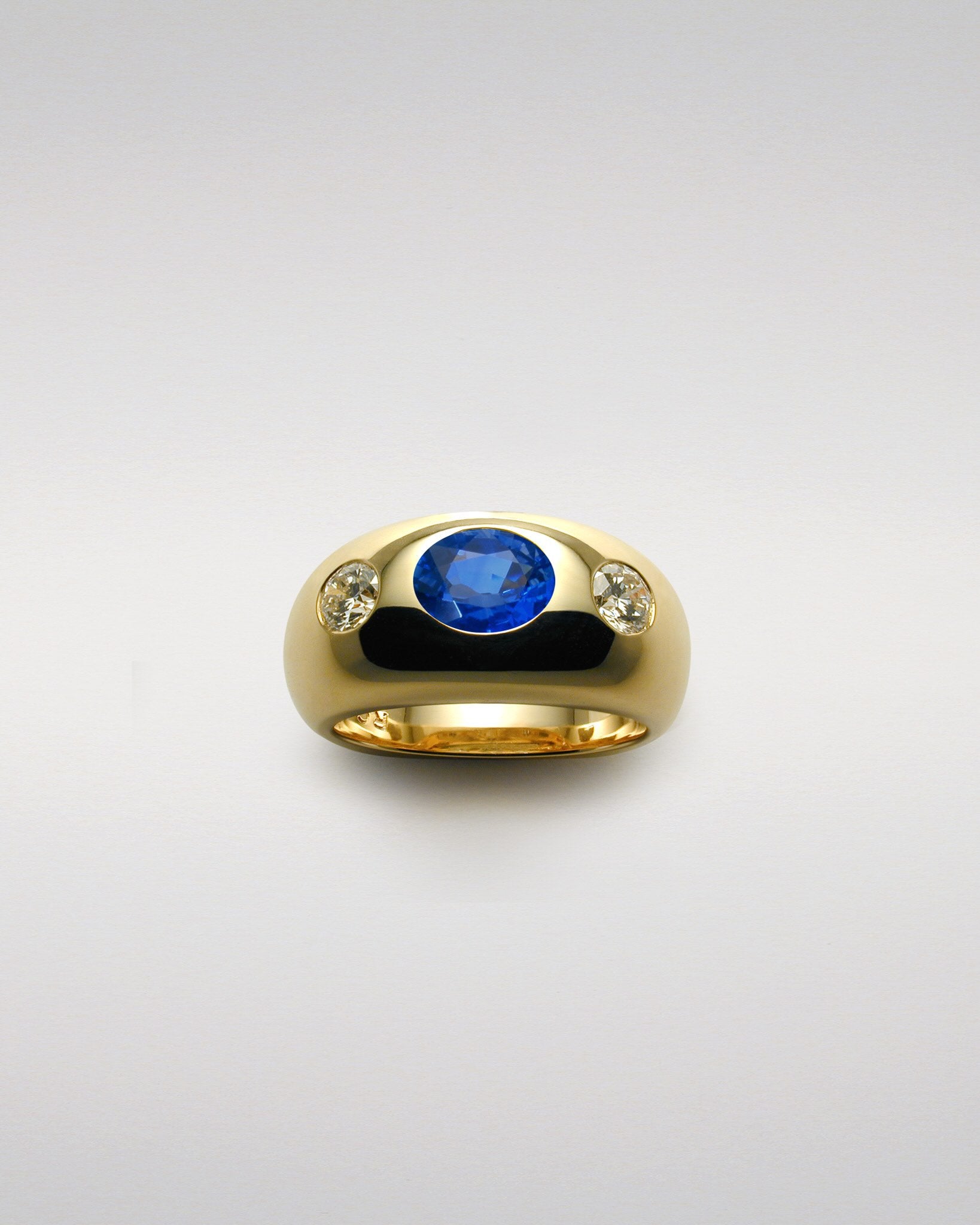 Sculptured Band with Sapphire and Diamonds