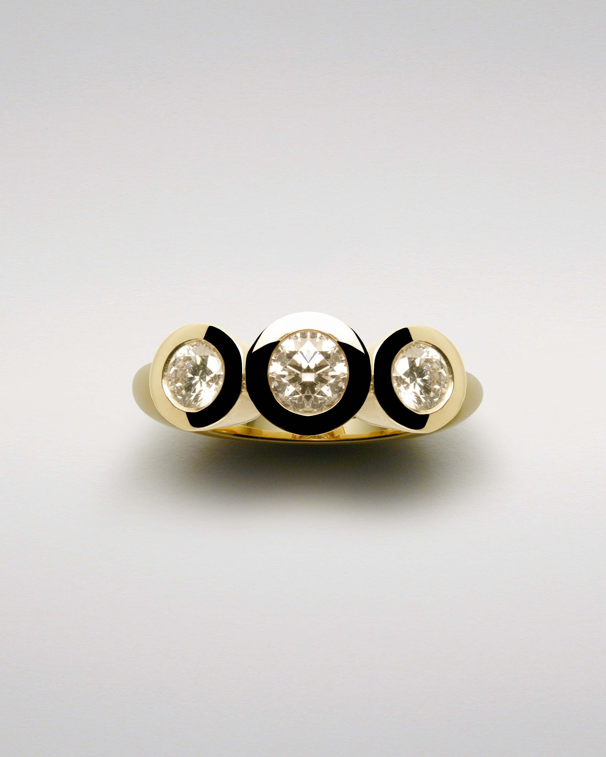 Three Brilliants Ring with Diamonds