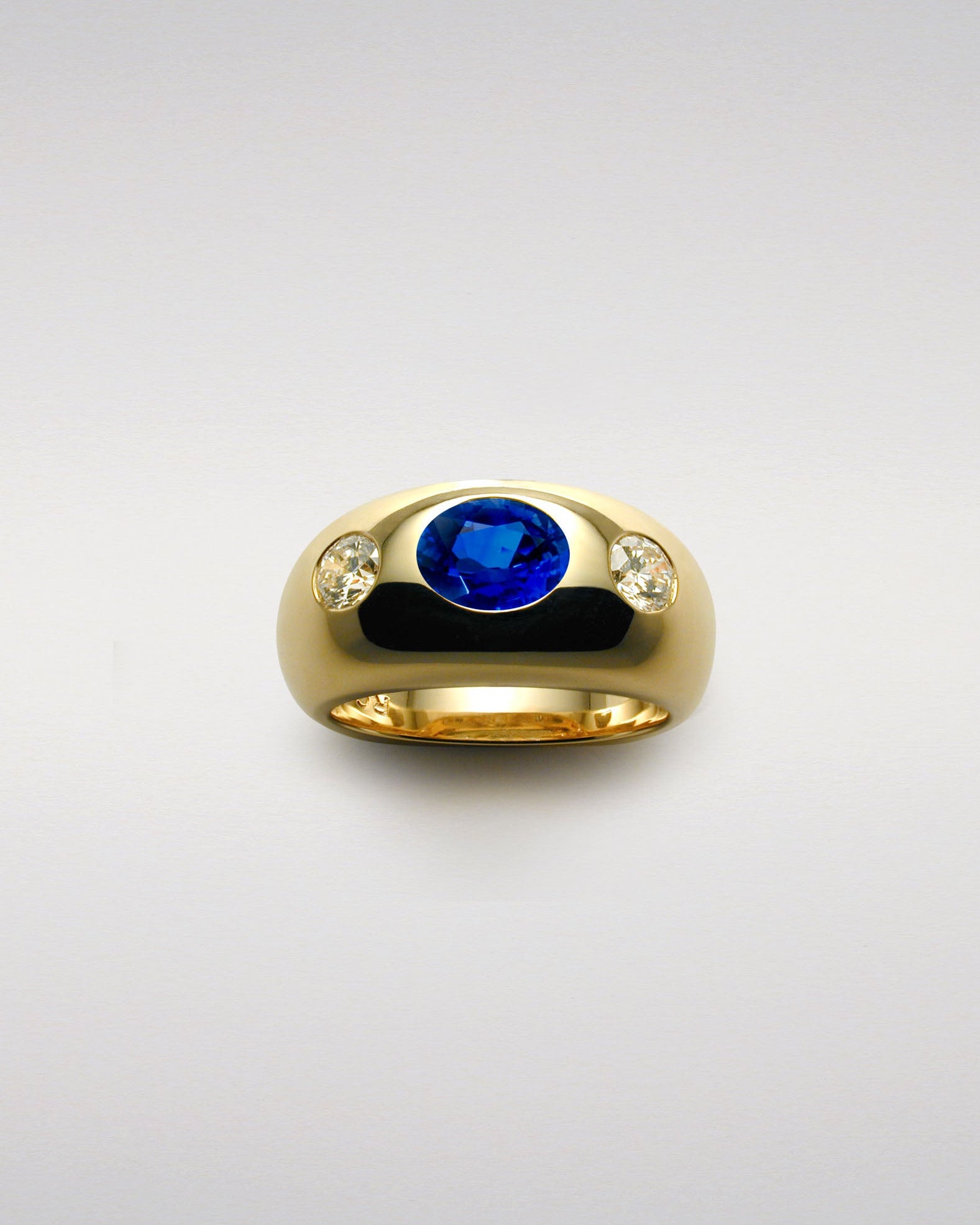 Sculptured Band with Sapphire and Diamonds